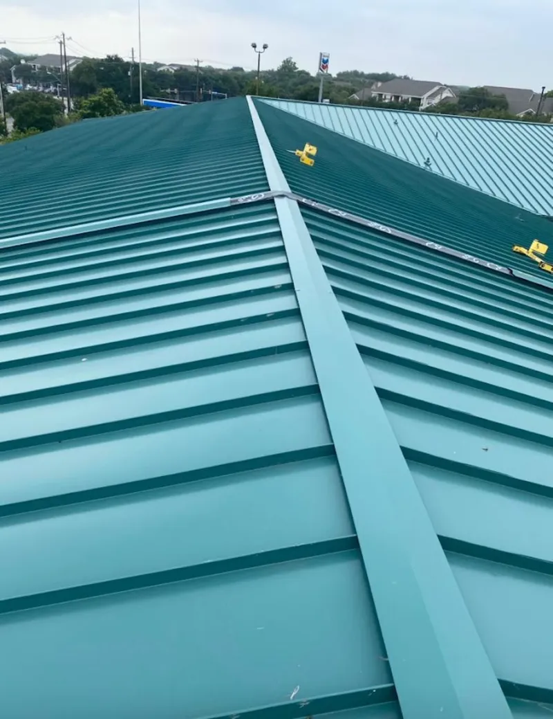 Green commercial metal roof ridge and valley for Metal Roof Repair in Broadview