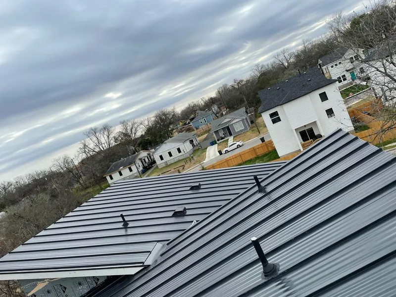 Standing seam metal roof panels with vents for Skylight Repair in Broadview